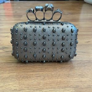 Pewter metallic skull clutch